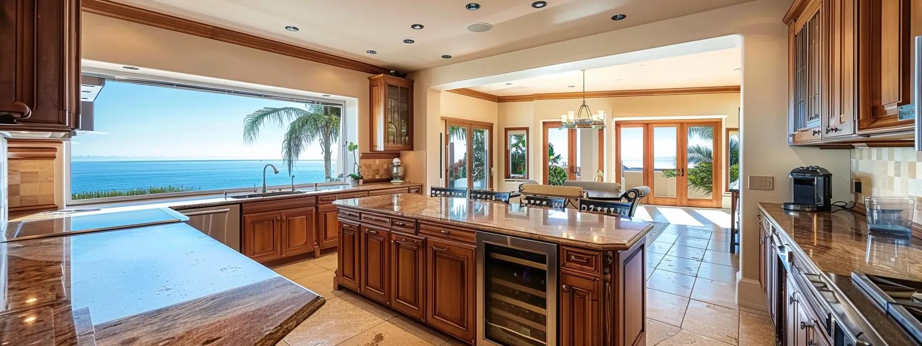 a sleek, modern kitchen with custom solid wood cabinets in a beach-themed san diego home, showcasing a blend of stylish finishes suitable for coastal climates.